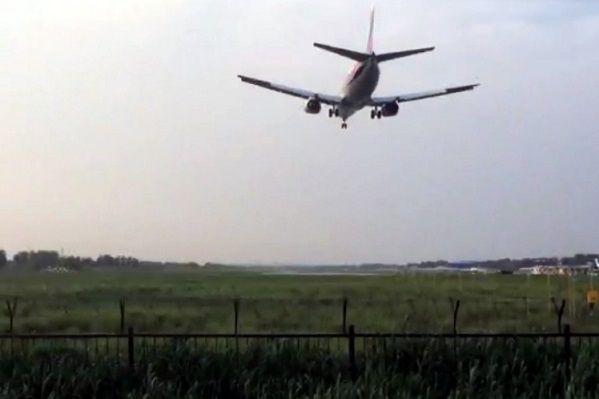 A plane attempting to land at Nanyuan airport landing strip.