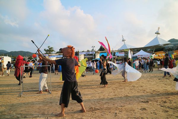 Chinese music festival attendees participating in outdoor events.