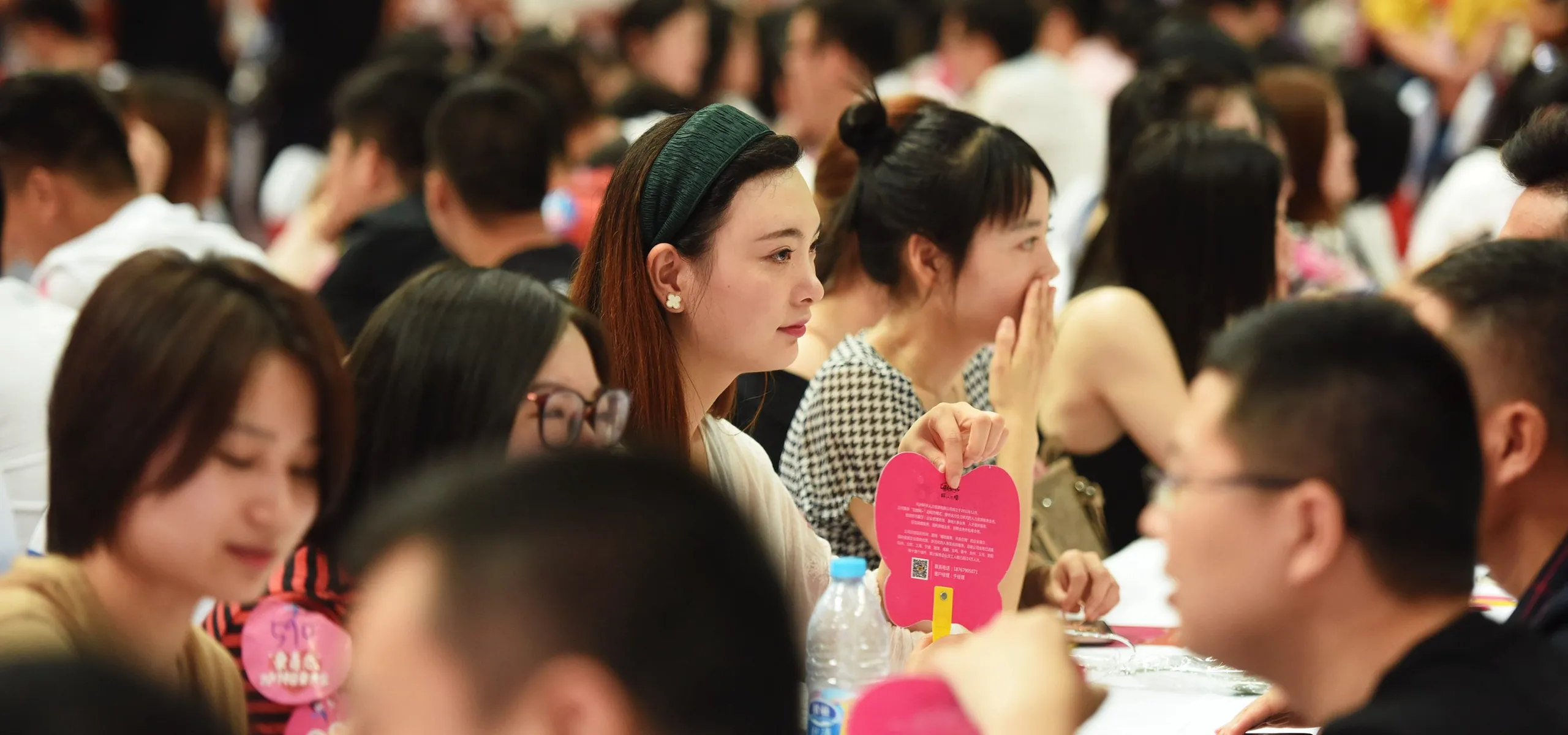 Young Chinese at speed dating event
