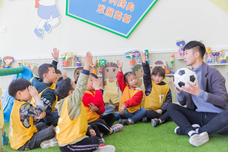 Male teacher teaches class in China