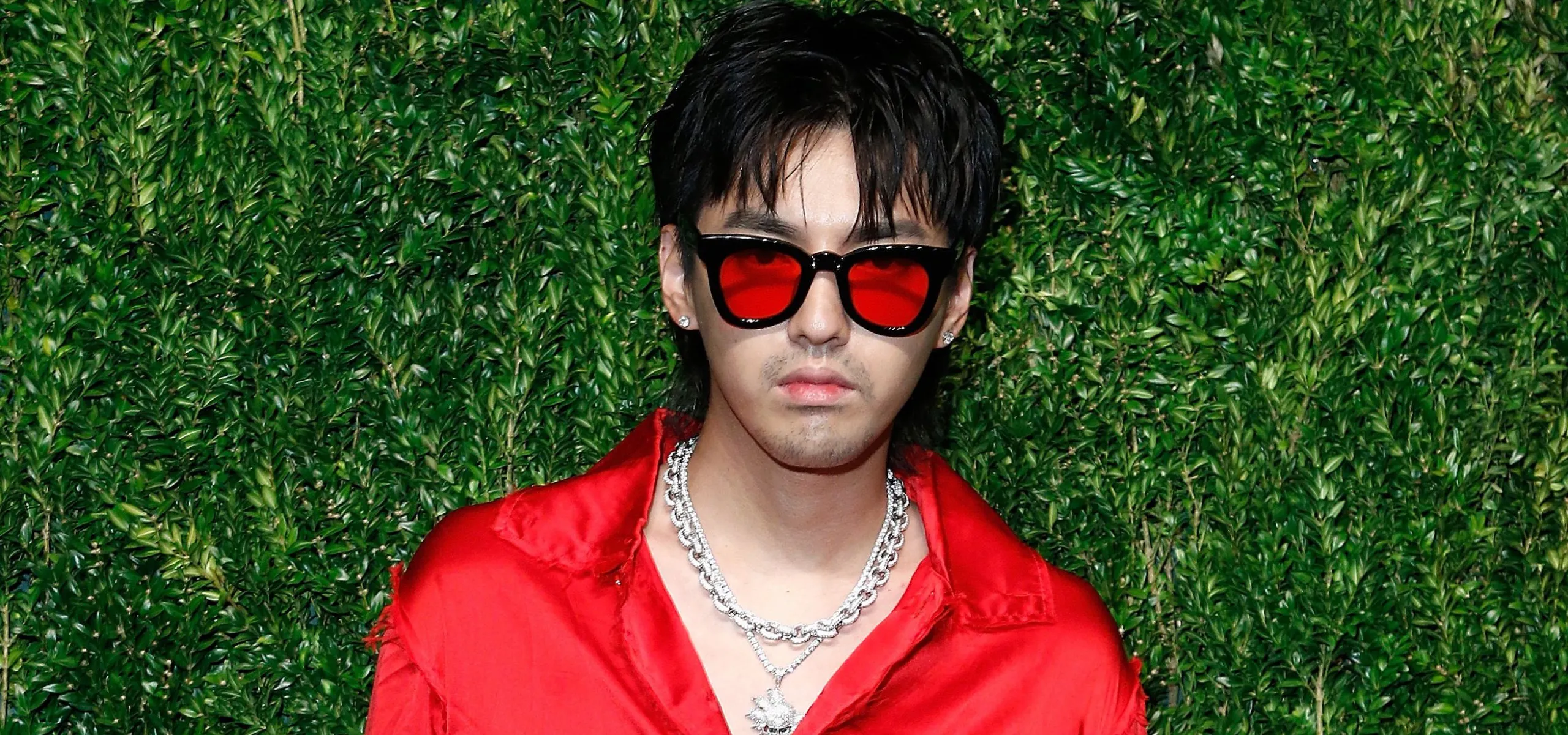 Kris Wu posing in red