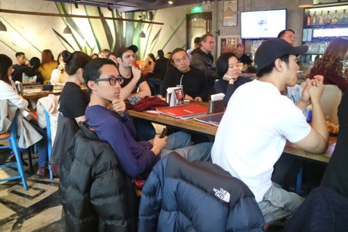 Attendees listening to The Farewell producer
