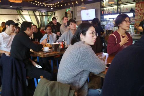 Attendees listening the Jane Zheng