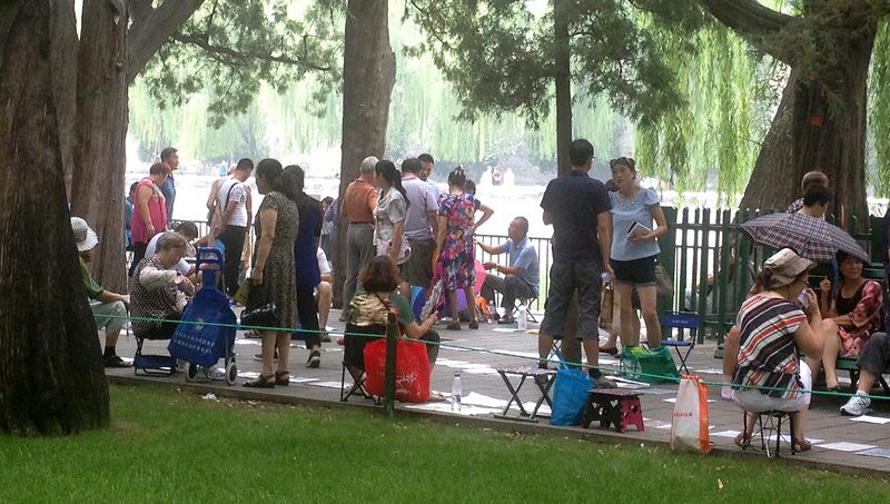 "Life is just about finding a good enough person to passing the days with—eat, sleep, go to work—not like the matchmaking corner, where it's all about competition," says Mr. Li, an eight-year veteran of the Zhongshan Park marriage market