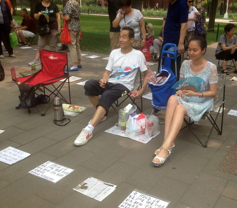 Mr. Zhu and his daughter are among the few attendees willing to talk openly about the matchmaking corner. "I don't have anything to hide," Mr. Zhu tells TWOC