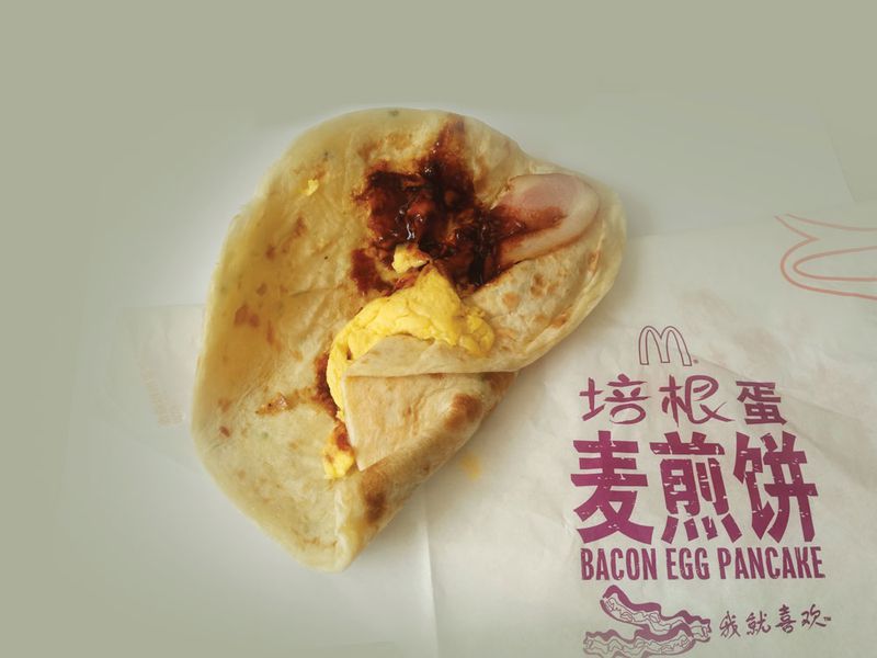 A Mc-Jianbing wtih bacon and egg inside