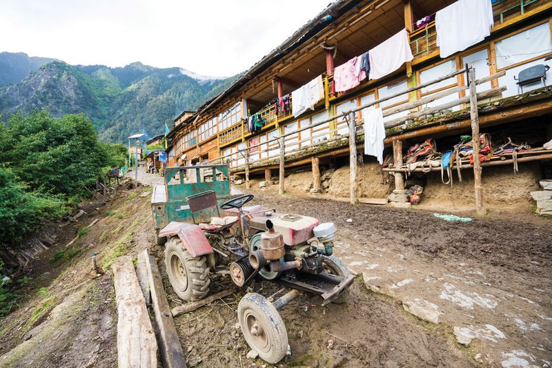 In lower Yubeng village, tractors and motorcycles are the most advanced forms of transportation