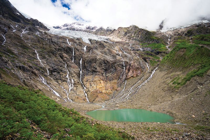 The ice lake on the Meili Mountains formed by melting glaciers